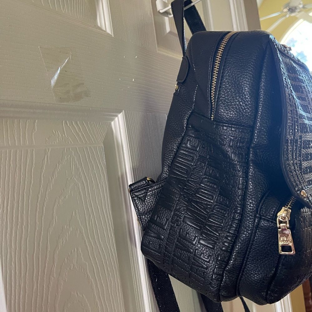 Steve Madden Black synthetic embossed small backpack gold tone hardwares. - Picture 5 of 16